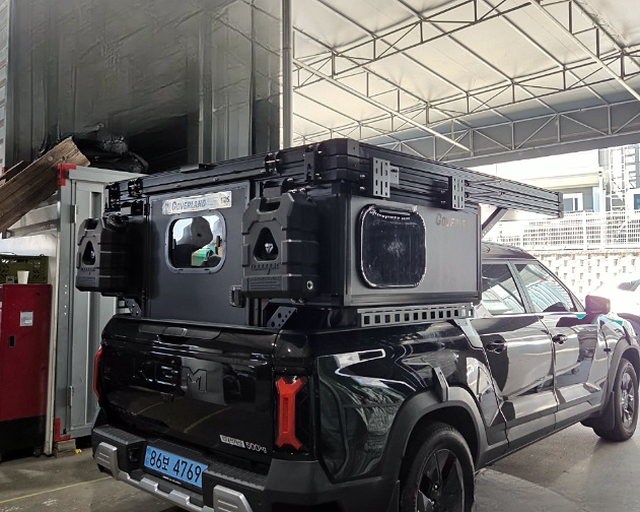 GOAT mounted on a KGM Musso EV